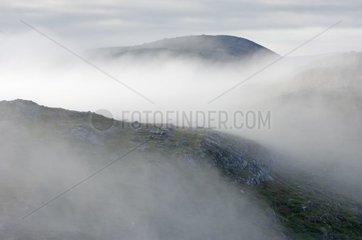Rocky summits in fog Finland