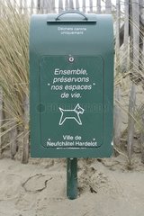 Dustbin for canine waste on a beach France