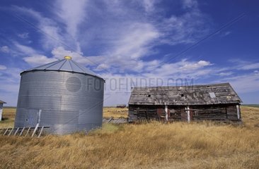 Old wooden barn and grain silo Saskatchewan Canada