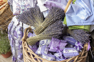 Bouquets and sachets of lavender in a wicker basket  summer  Provence  France