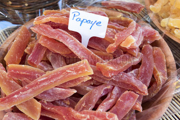 Pieces of candied papaya on a market stall  summer  Provence  France