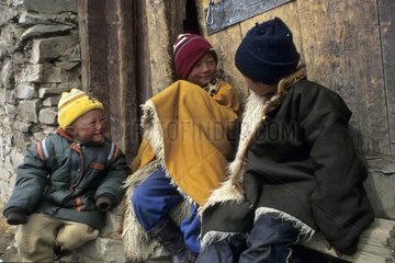 Tibetans children in front of their house Area of Kham China