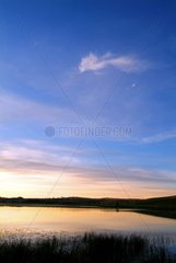 Sunrise on the lake de Jolan in the Cantal France