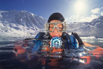 Diving under ice Alps Europe