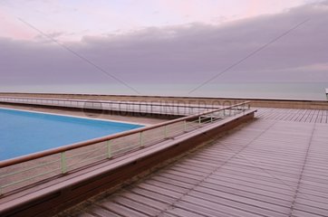 Wooden platform near a swimming-pool Sotteville France