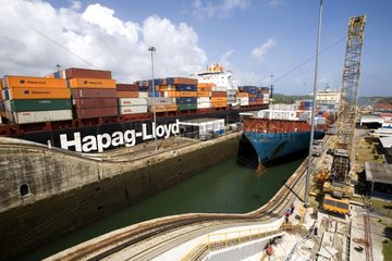 Container ships running the Gatun locks Panama Canal