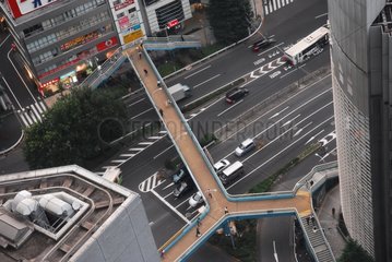 Footbridge over a large artery in Tokyo