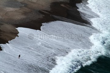 Man on the beach of Porto Corsica France