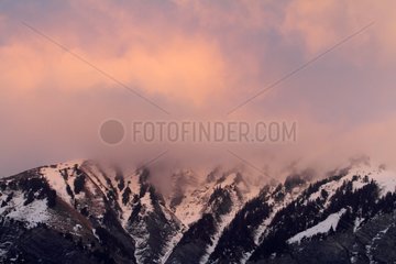 Snow-capped summits at dusk Massif des Arves Alps France