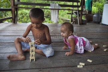 Children playing dominoes - Amapa Brazil Amazon
