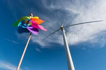 Multicolored wind mill and wind turbine - France