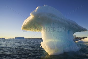 Small iceberg drifting in Disko Bay mid summer night