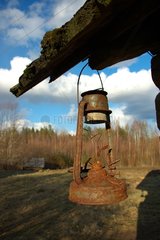 Old kerosene lamp on a countryside house in Latvia