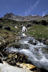 Torrent and cascade at the Roche Ferran in the vanoise
