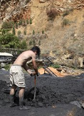 Manufacture of coal briquette Lake Erhaï Yunnan China