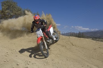 Motocross pilot in circuit Spain