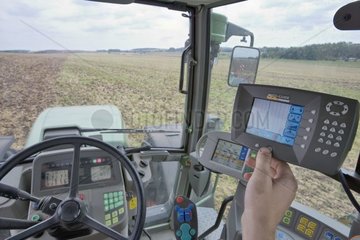 Controls of a GPS system in a tractor