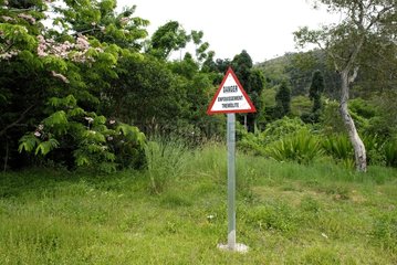 Sign indicating a buried tremolite area New Caledonia