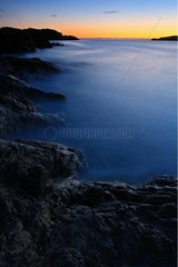 Scourie rock shore at dusk Scotland