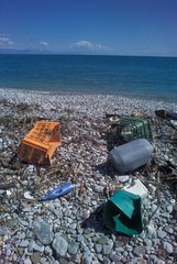 Beach polluted in April on the gulf of Corinth Greece