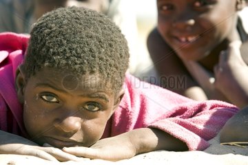 Child with soft and pensive glance Botswana