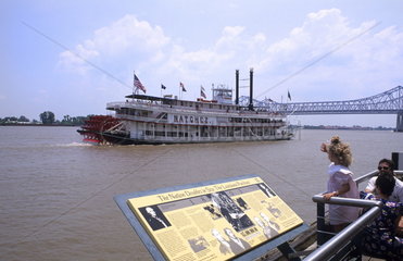 Riverboat on the Mississippi River and sign in wonderful city of New Orleans Louisiana NOLA USA