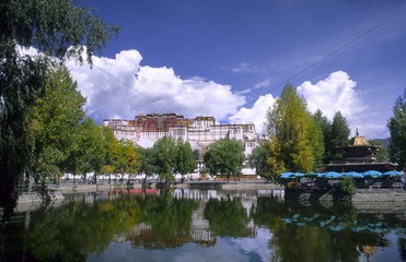 Wonderful Potala Palace on mountain the home of the Dalai Lama with lake in capital city of Lhasa Tibet China