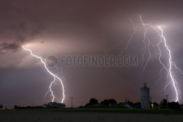 Branched lightning strikes at evening Isere France