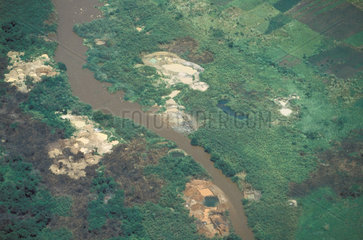 Congo  Butembo. Aerial view of open coltan mines. Coltan is the colloquial African name for columbite-tantalite  a metallic ore used to produce the elements niobium and tantalum. Coltan is the ore for tantalum used in consumer electronics products such as