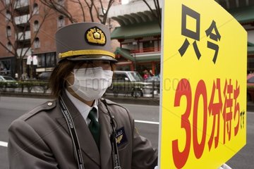 Air pollution and guard of carpark in Tokyo Japan [AT]
