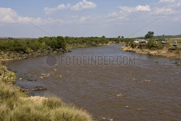 Tourists on the Mara River bank Masai Mara Kenya