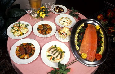 Table of fine dining of sea food with salmon and other fine dishes