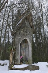 Woody chapel in Bialowieza forest in winter Poland