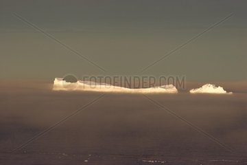 Iceberg of Southern Ocean in fog Terre Adelie