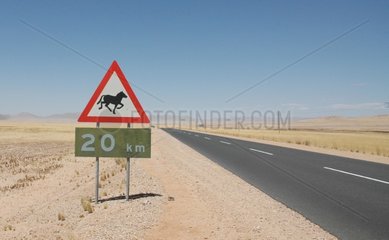 Danger panel preventing the wild Horse crossing