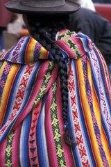 Braid of a woman in traditional clothe Peru