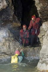 Difficult passage in speleology in the river Meuse
