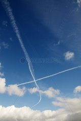 Trails of airplanes and cloud clouds sky fall