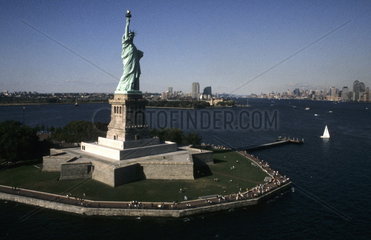 The beauty of the famous Statue of Liberty from a plane above the monument before 9/11 in New York City USA