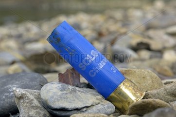 Hunting cartridge abandonned on a gravel pit Allenjoie