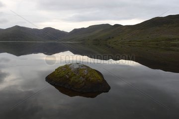 Reflections on Derriana lake in the county of Kerry Ireland