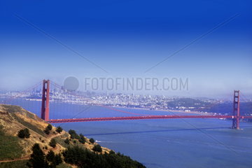 Famous Landmark of San Francisco the Golden Gate Bridge and the bay and city behind