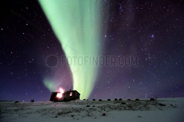 Hunting cabin and Aurora borealis Greenland