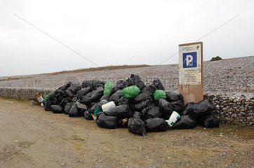 Waste in front of a dike Cayeux France
