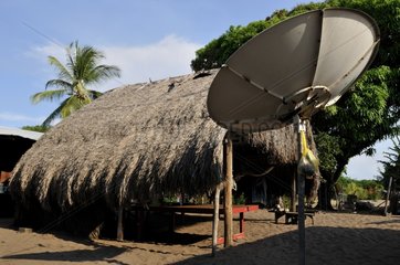 Satellite dish near an indian house Yalimapo French Guiana