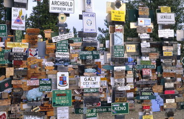 Famous 25 000 town sign post forest in Watson lake Yukon Canada