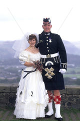 Traditional wedding couple on marriage wedding day in Glasgow Scotland
