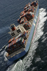 Aerial view of a container ship on the North sea off the Dutch coast