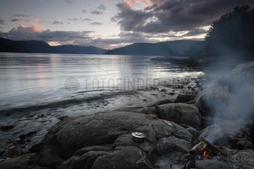 Bivouac at the edge of water at twilight Norway