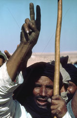 WESTERN SAHARA : Polisario supporter at a political rally in the desert.